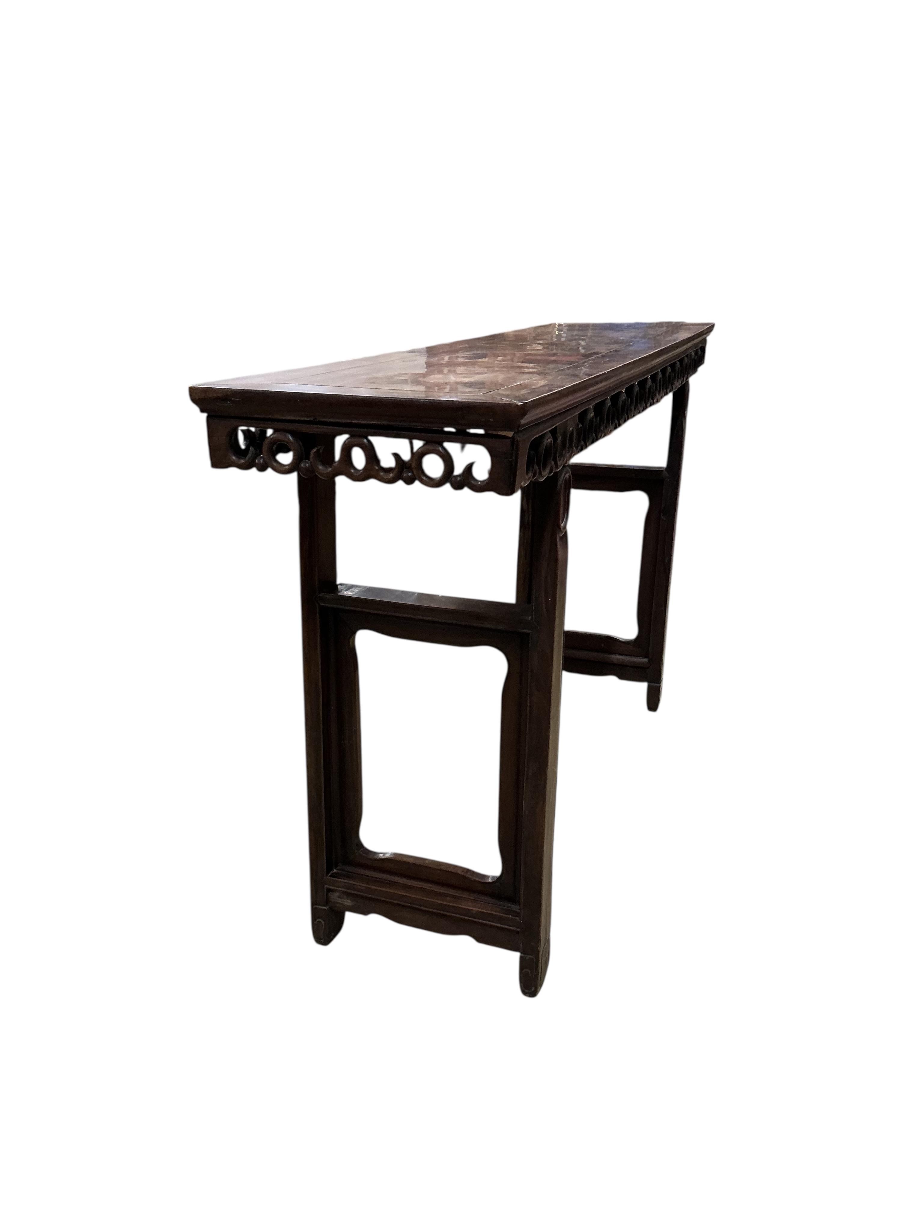 A Chinese altar table, width 181cm, depth 45cm, height 101cm